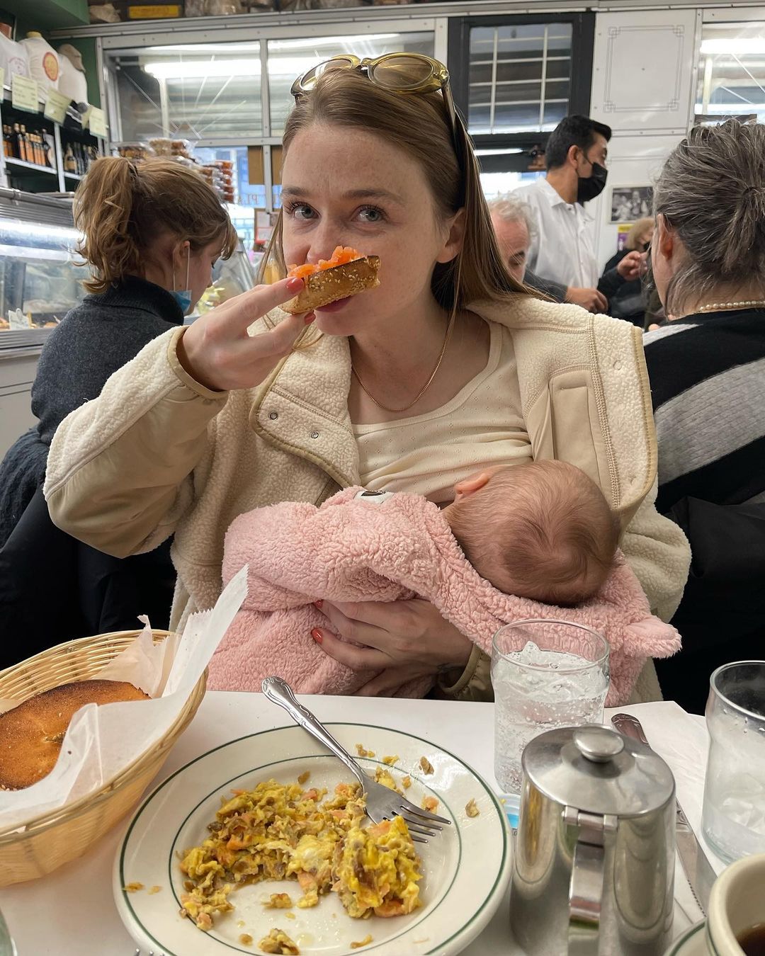 Jessica Barden holding her baby.