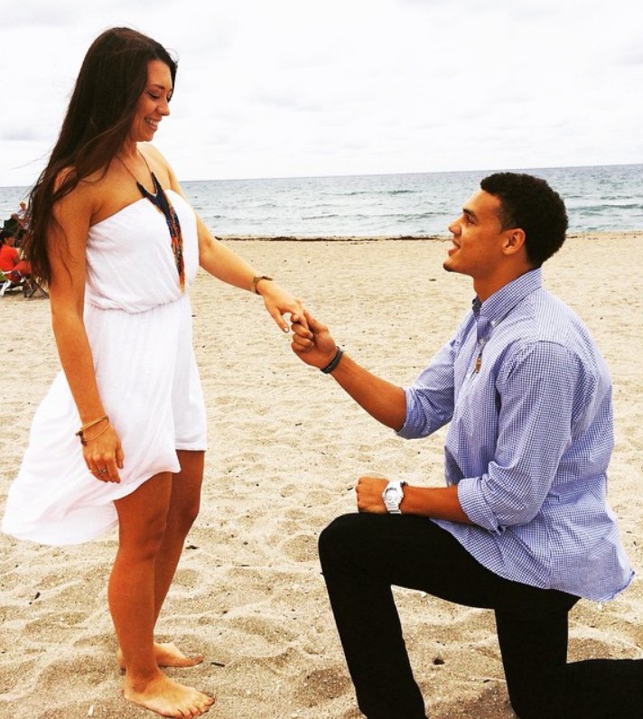 Justin Simmons proposing to Taryn Simmons