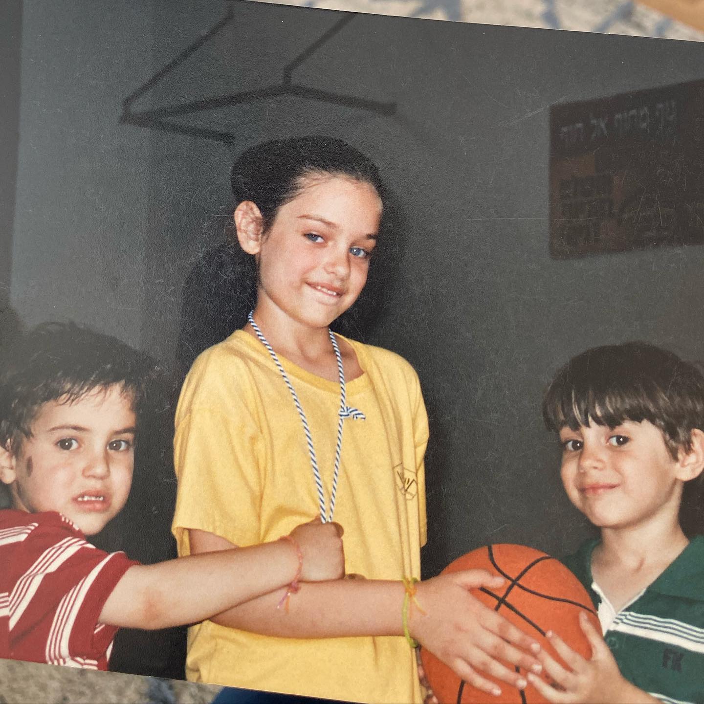 An old picture of Odeya Rush with her two siblings
