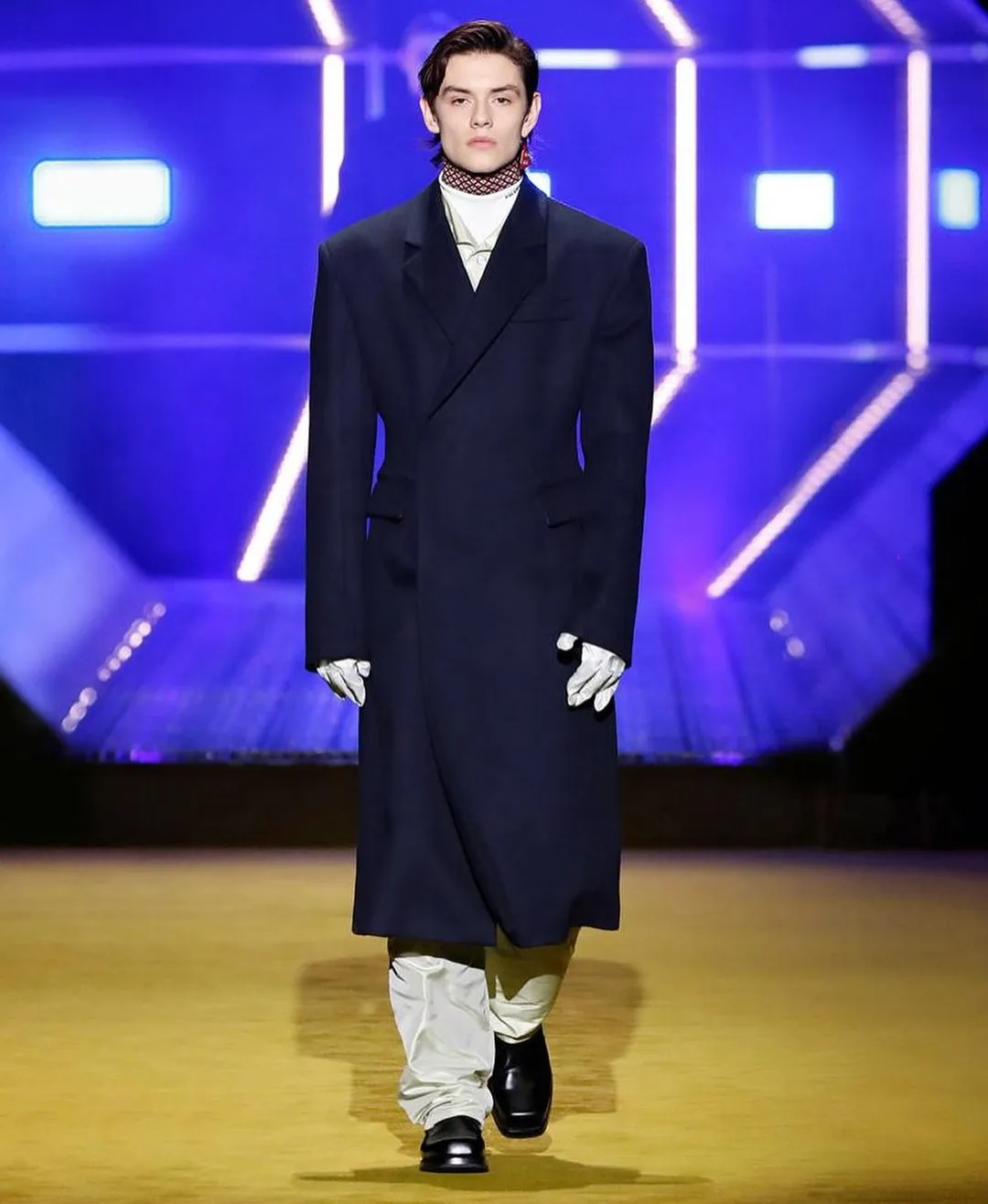 Louis Partridge standing tall at a Prada event in Milan, Italy