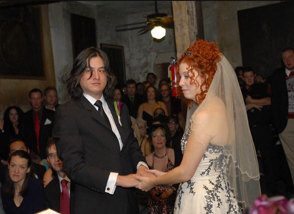 Sean Yseult with her husband, Chris Lee, at their wedding ceremony