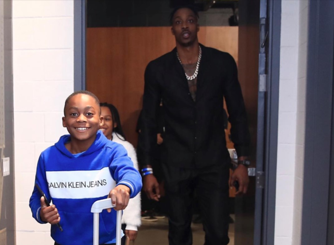 Dwight Howard traveling with his son Braylon. 