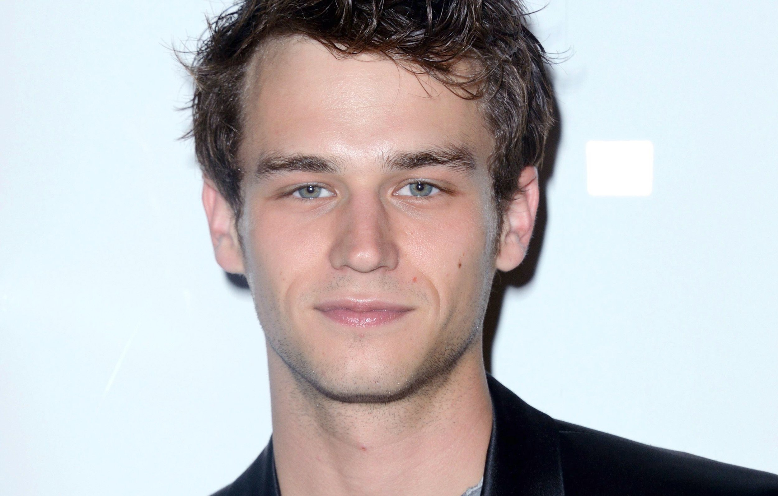 Brandon Flynn's age is 29, and his height is allegedly 5'11"