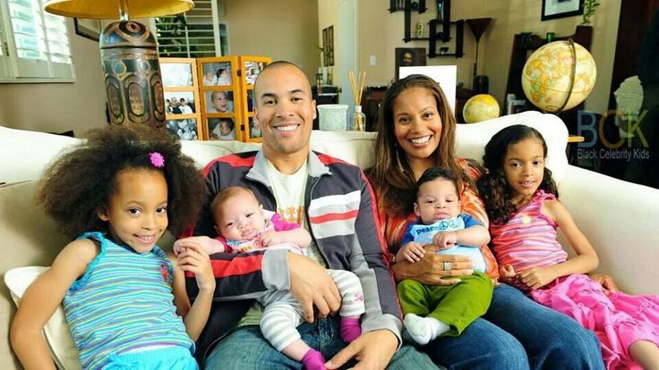 Coby Bell with his two sets of twins, children, and wife. 