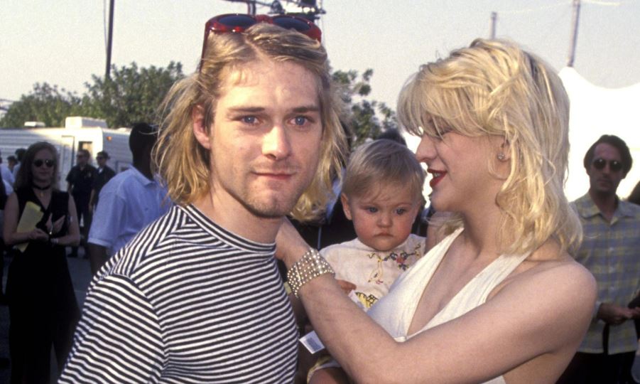 Kurt Cobain and Courtney Love with their daughter at the 10th MTV Video Music Awards 