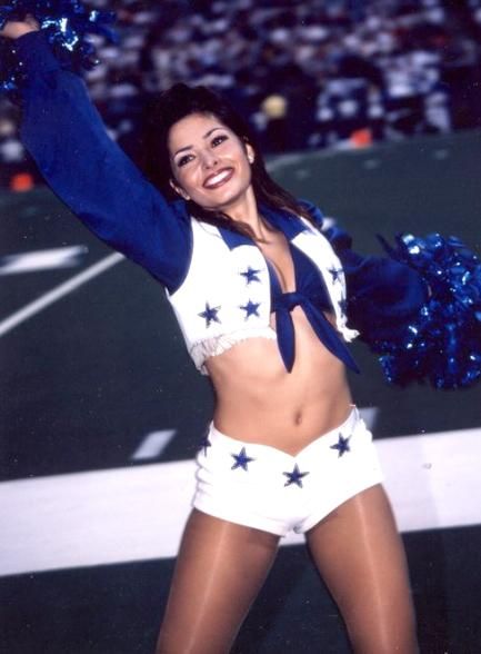 Sarah Shahi when she was a cheerleader.