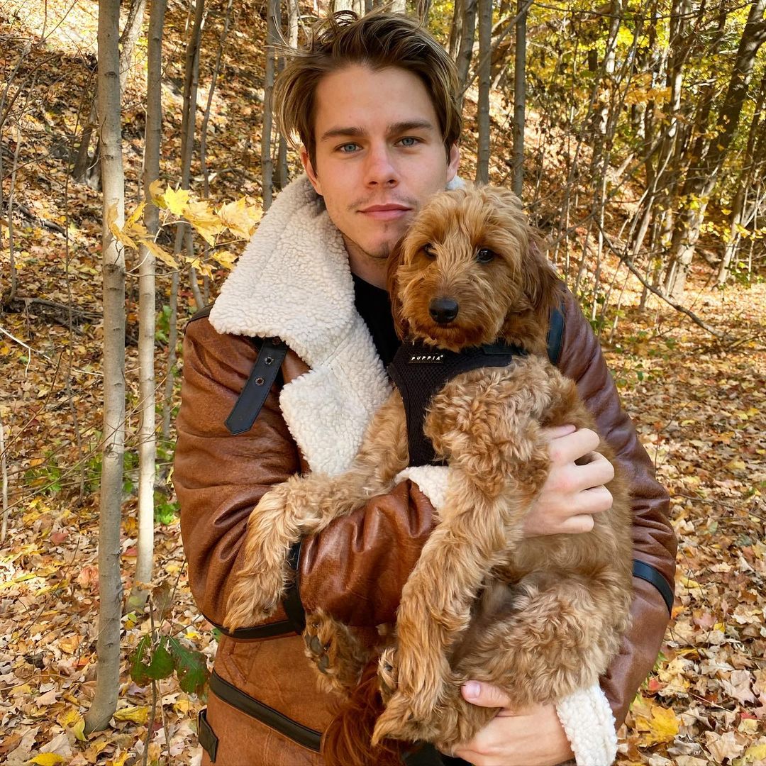 Jake Manley pictured with his pet Golden Doodle Rupert