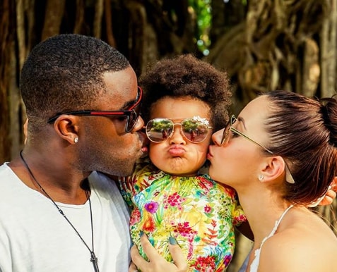 Joel Campbell and Maria Cascante take a sweet snap with their daughter Briana. 