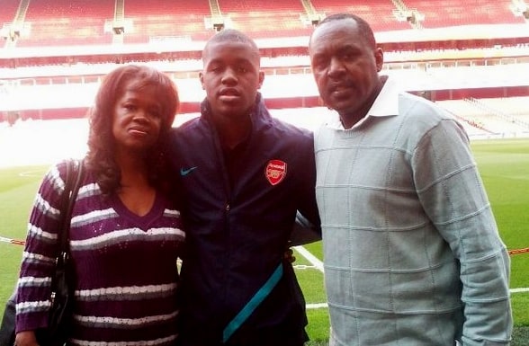 Joel Campbell is pictured with his mom and dad. 