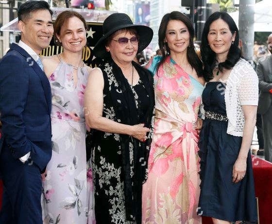 Lucy Liu with her mother and siblings