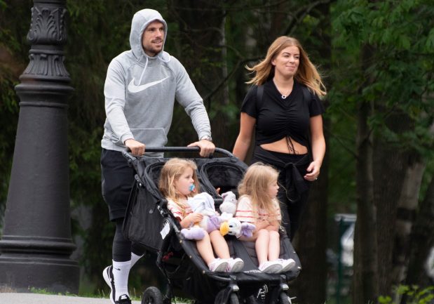 Jordan Henderson with his wife and daughters.