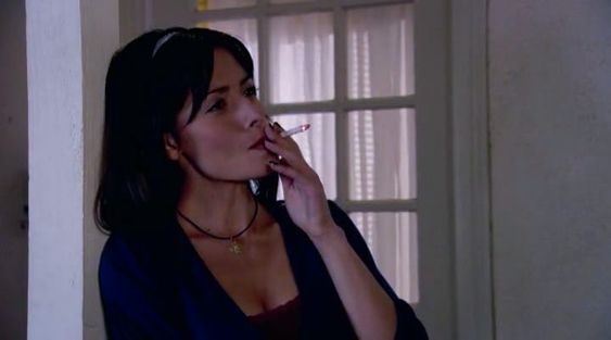 Sarah Shahi smoking in the series.