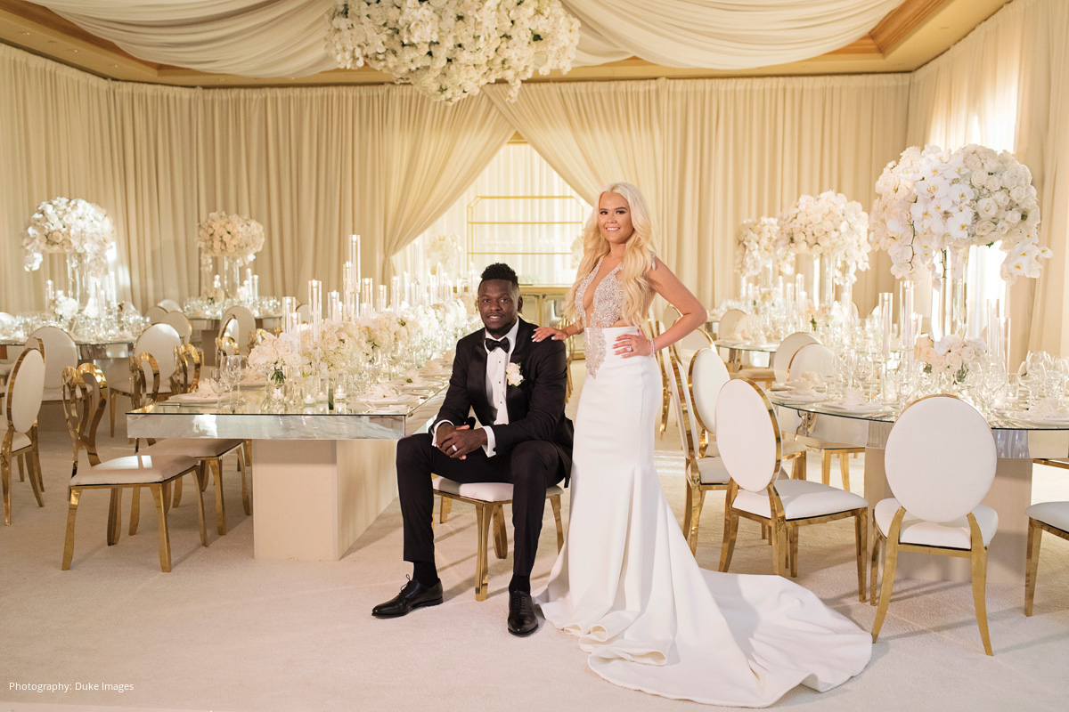 Julius Randle with his wife during their wedding.