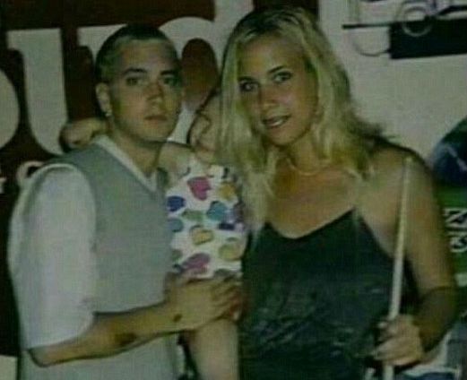 Eminem and Kim Scott with their daughter.