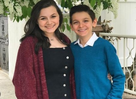 Luca Padovan with his sister.