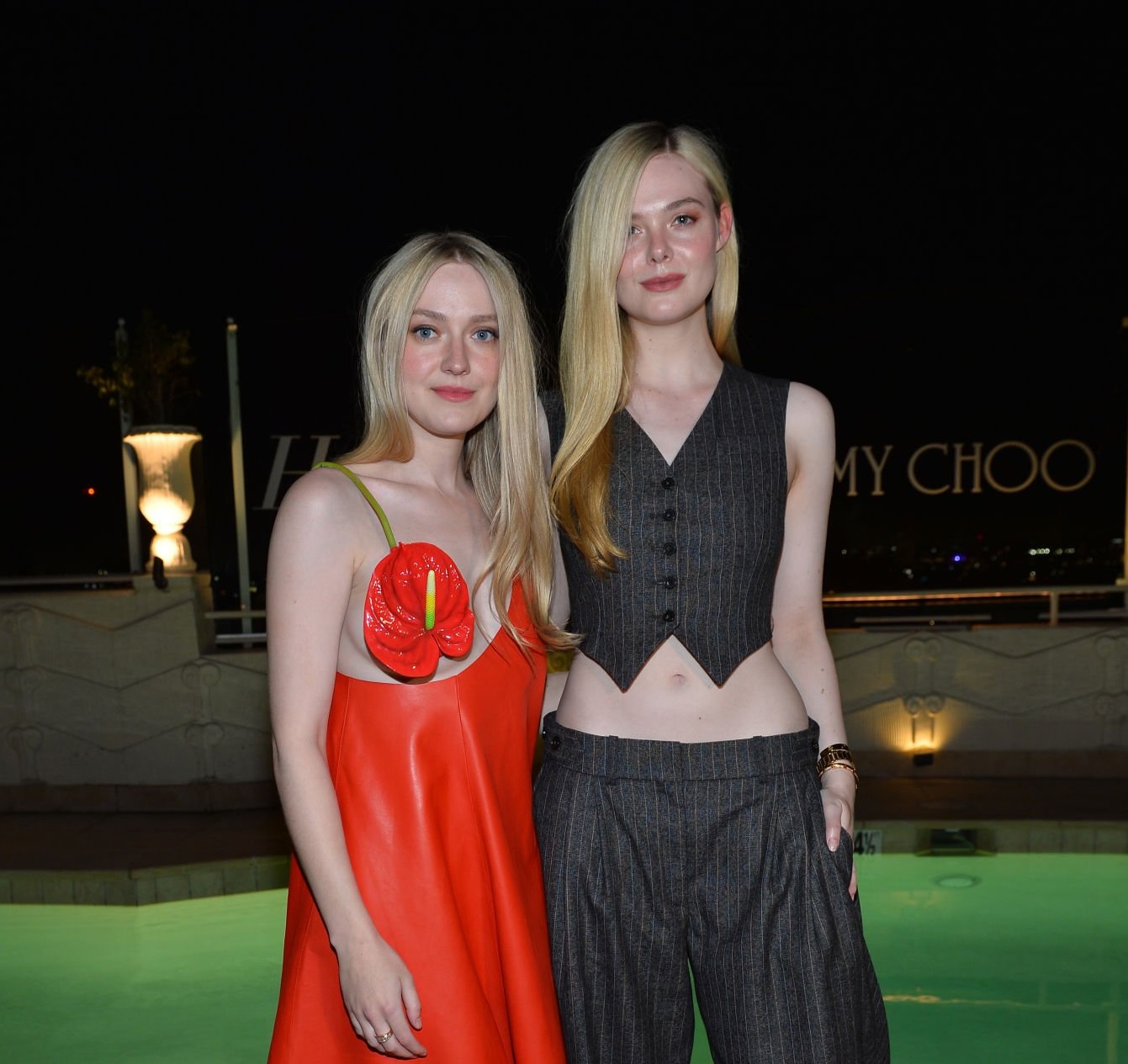 Dakota Fanning and Elle Fanning attend The Hollywood Reporter And Jimmy Choo Power Stylists Dinner
