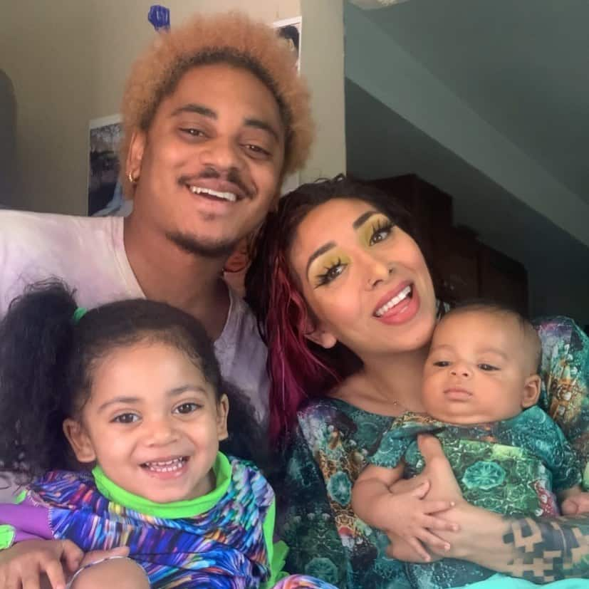 Corde Broadus and his wife pictured with their children