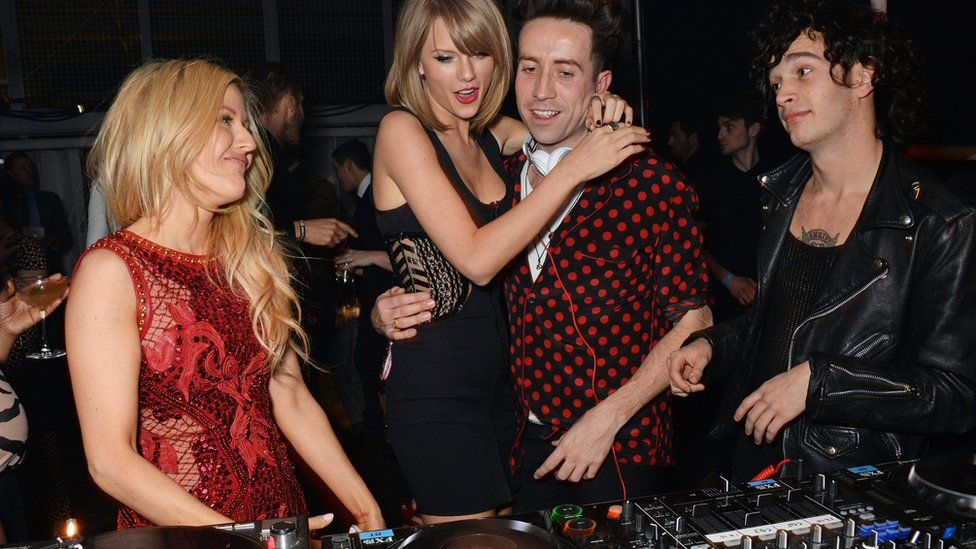 Taylor Swift and Matty Healy pictured with Nick Grimshaw and Ellie Goulding in 2015