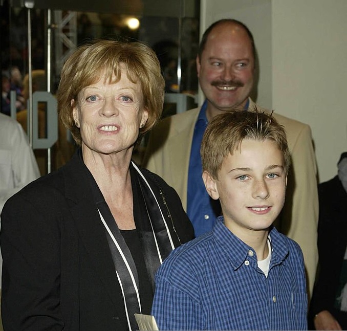 Maggie Smith with one of her grandchildren in 2002