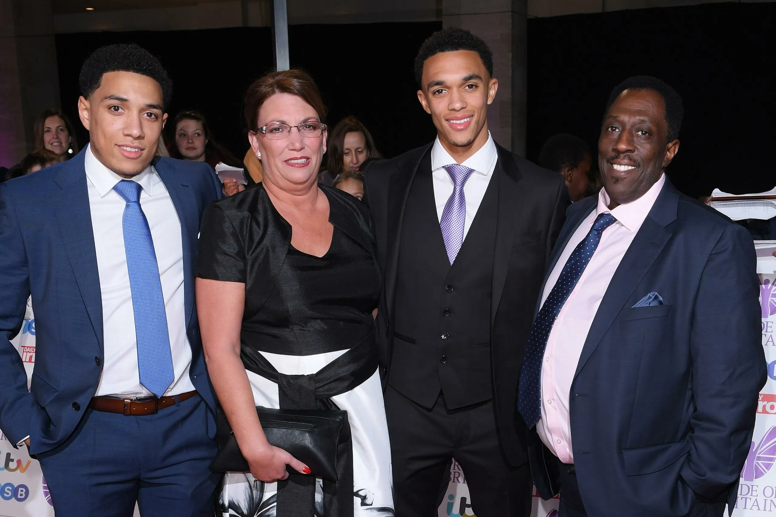 Trent Alexander-Arnold with his parents