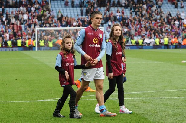 Jack Grealish on the field with his two sisters Kiera and Holly 