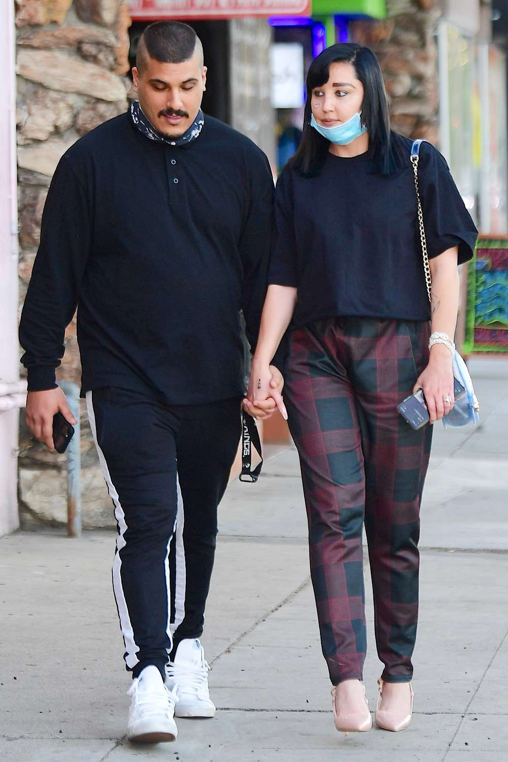 Amanda Bynes walking with her supposed to be husband Paul Michael