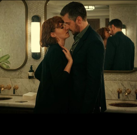 Richard Armitage with a woman in a scene of the movie ‘Obsession.’