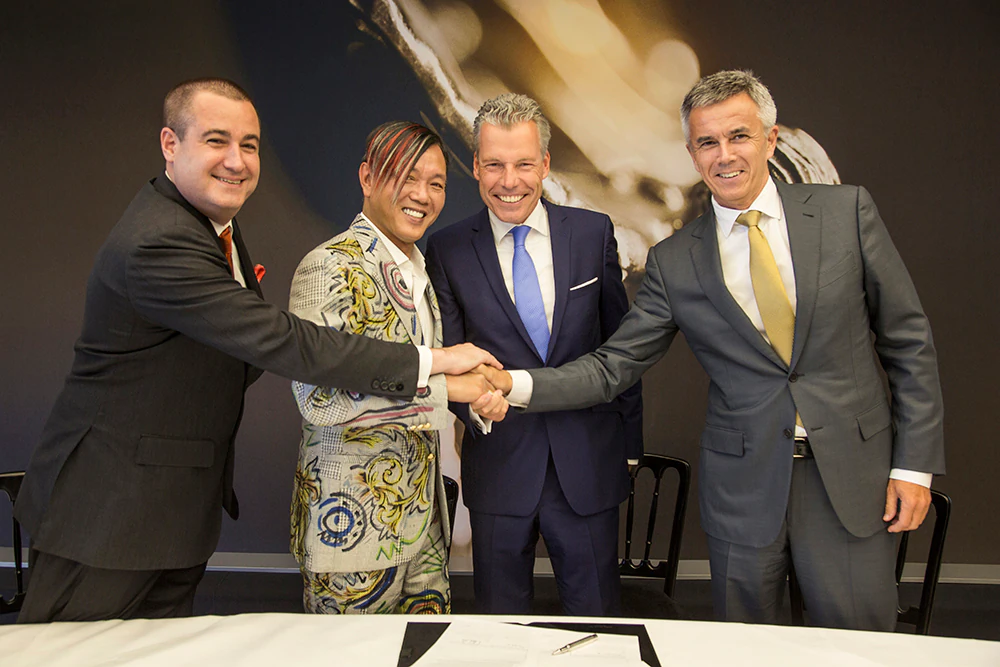Stephen Hung pictured with Peter Coker, the joint chairman of Louis XIII  Torsten Mueller-Oetvoes, chief executive of Rolls-Royce Motor Cars; and Peter Schwarzenbauer,
