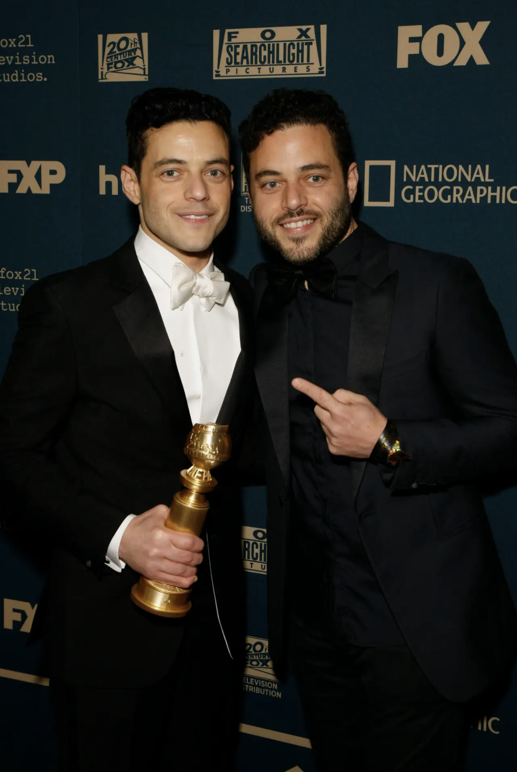 Rami Malek at Golden Globes Awards with his twin brother Sami Malek