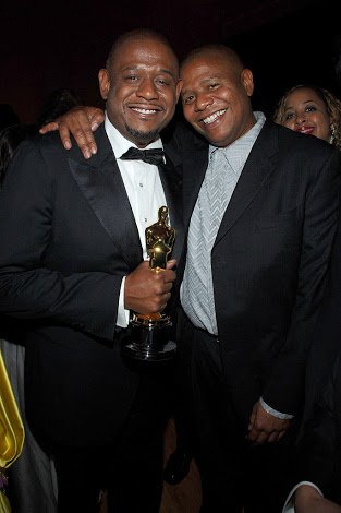 Kenn Whitaker with his older brother Forest Whitaker after Forest's Oscar win