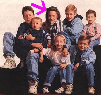 An old picture of the seven Culkin siblings, with the highlighted arrow on Macaulay's late sister Dakota